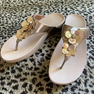 Fitflop bronze flower sandals.